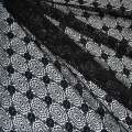 Кружевное полотно стрейч круги с цветами черное ш.150 оптом