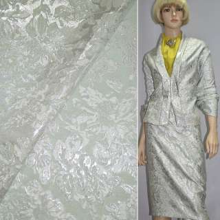 Фукра костюмна салатова з сріблястими квітами ш.156 оптом