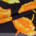 Коттон-жаккард стрейч чорний в оранжево-жовті квіти ш.145 оптом