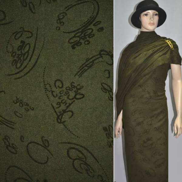 Тканина костюмна темно-зелена з завитками з флока ш.150 оптом