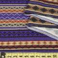 Трикотаж бежевый в фиолетовые, коричневые полоски с орнаментом, ш.160 оптом