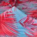 Трикотаж голубой с розово-красными листьями ш.165 оптом