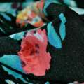 Трикотаж с вискозой черный с кораллово-бирюзовыми цветами ш.170 оптом