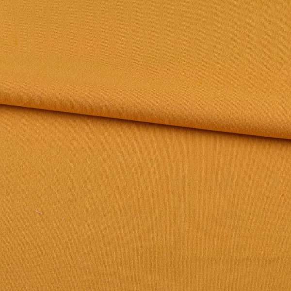 Трикотаж на флисе желто-оранжевый ш.190 оптом