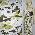 Трикотаж вискозный стрейч белый в крупные зелено-белые цветы с листьями оптом