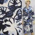 Трикотаж віскозний біло-блакитний з темно-синіми квітами, ш.160 оптом