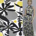 Трикотаж вискозный стрейч белый с черными цветами и серо-желтыми кругами ш.150 оптом