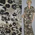 Трикотаж вискозный стрейч песочно-серый с черными леопардовыми пятнами ш.149 оптом