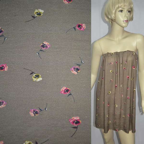 Трикотаж віскозний болотний світлий з рожево-жовтими квіточками ш.150 оптом