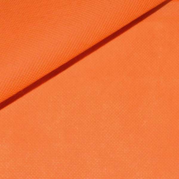 Флизелин неклеевой (спанбонд) оранжевый, плотность 70, ш.160 оптом
