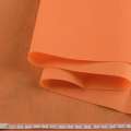 Флизелин неклеевой (спанбонд) оранжевый светлый, плотность 70, ш.160 оптом