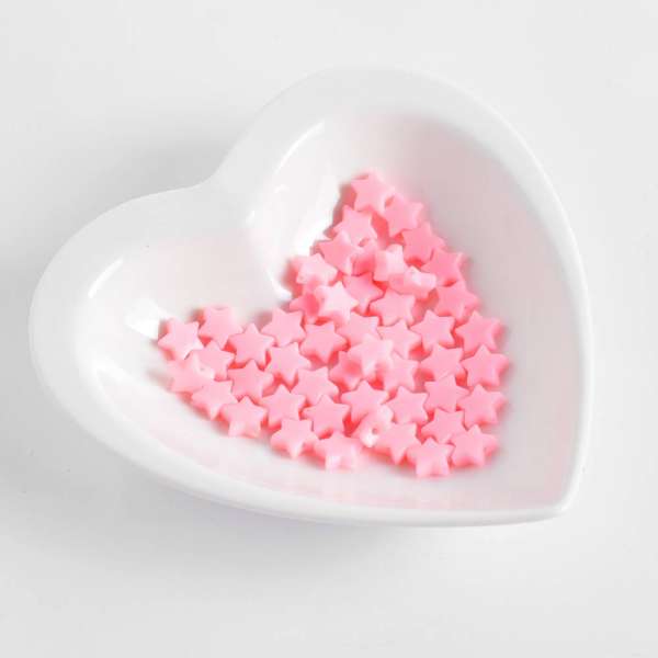 Бусина пластик зірочка 10мм рожева (ціна за 1 г) оптом