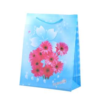Пакет подарунковий 23х18х7,5 см з квітами рожевими блакитний оптом