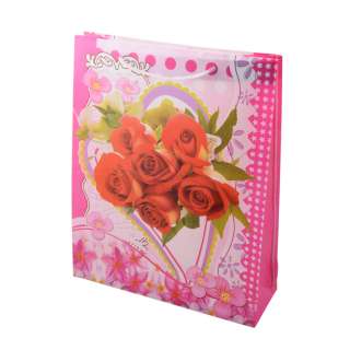 Пакет подарунковий 38х30 см з трояндами в серці рожево-червоний оптом