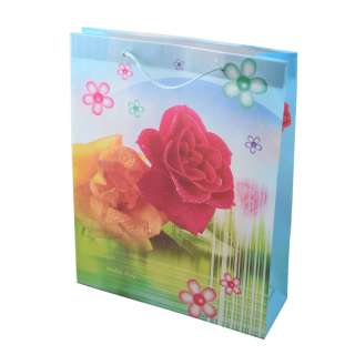 Пакет подарунковий 38х30 см з трояндами і каллами блакитний оптом