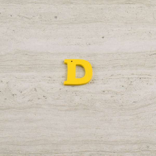 Пришивний декор літера D жовта, 25мм оптом