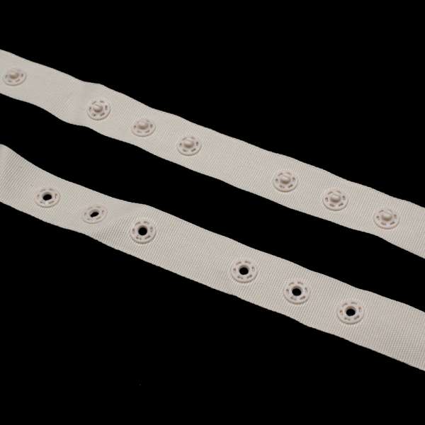 Кнопки пластиковые на тесьме 17 мм беж оптом