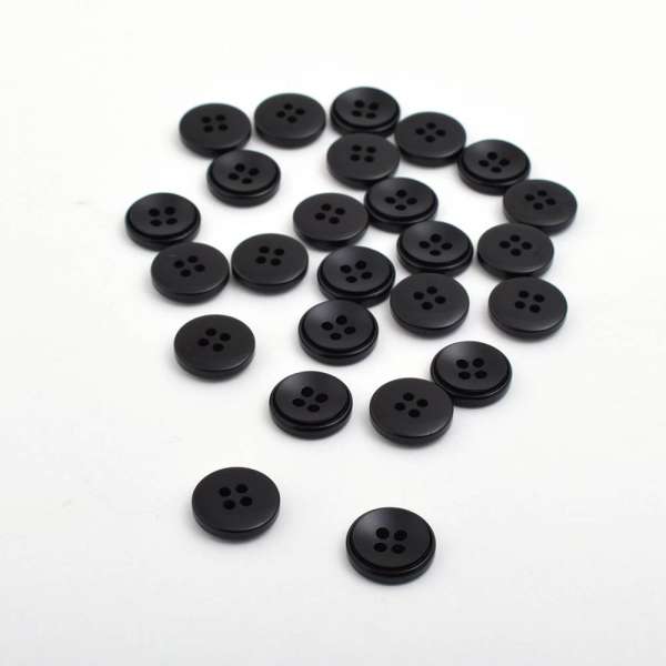 Пуговица черная 15мм на 4 прокола (1002) оптом